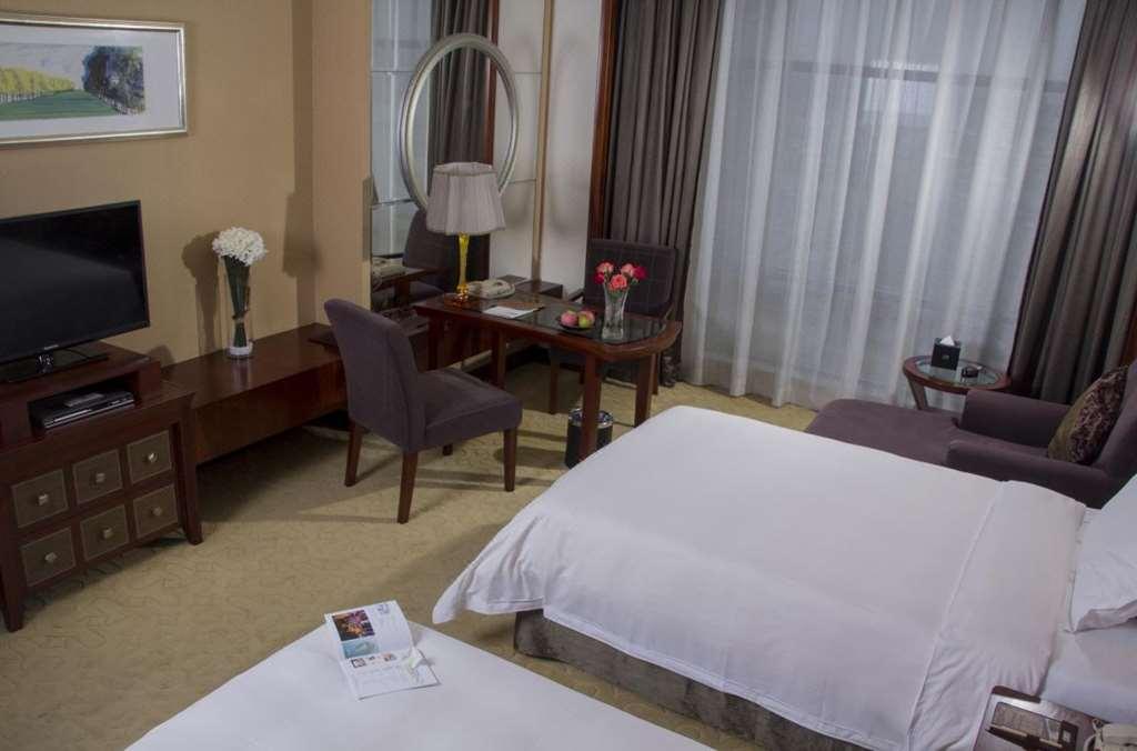Grand Oriental Hotel Tung-kuan Pokoj fotografie